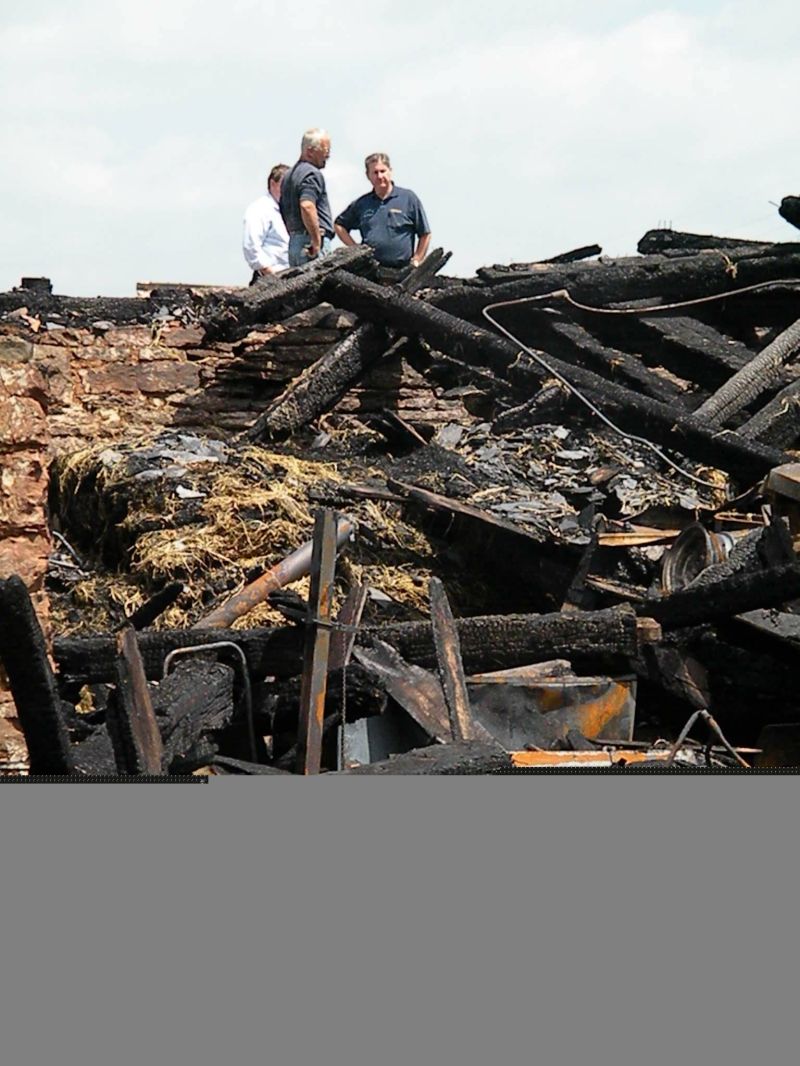 020711 New building rises from the ashes of the Care Center barn