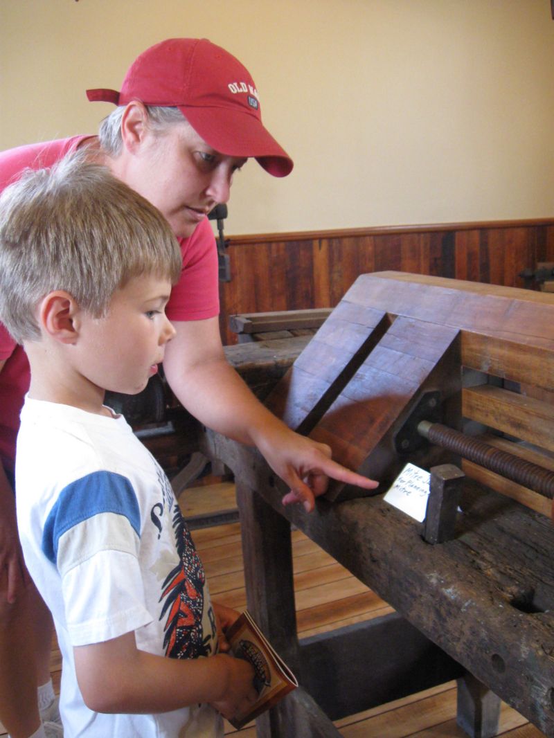 0725 Depot and caboose on board for historical journey in Smithville
