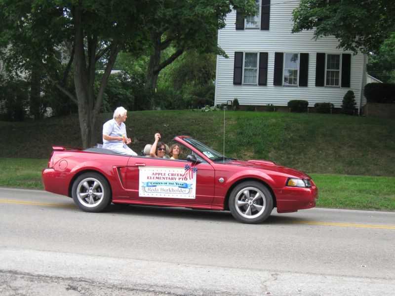0801 Appleseed Festival parade takes a bite out of the heat and summer storms