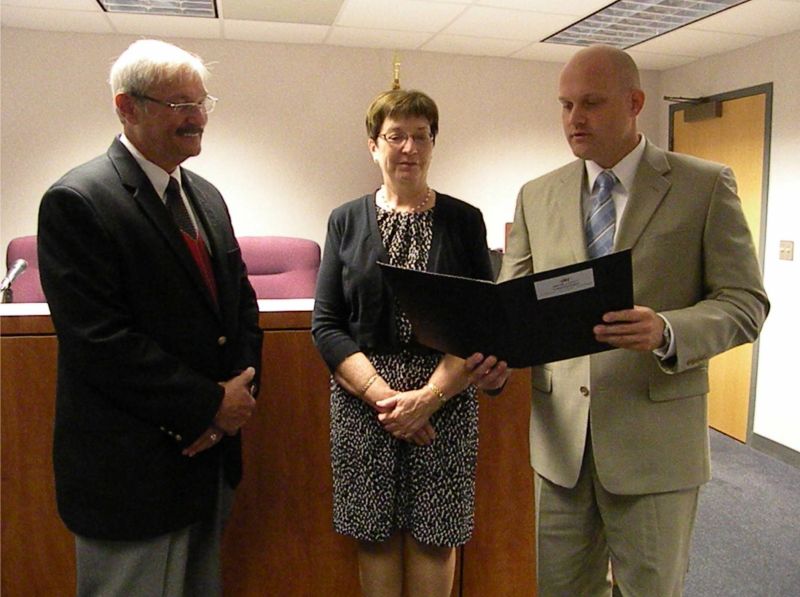082211 Commissioners honor Roy Bates