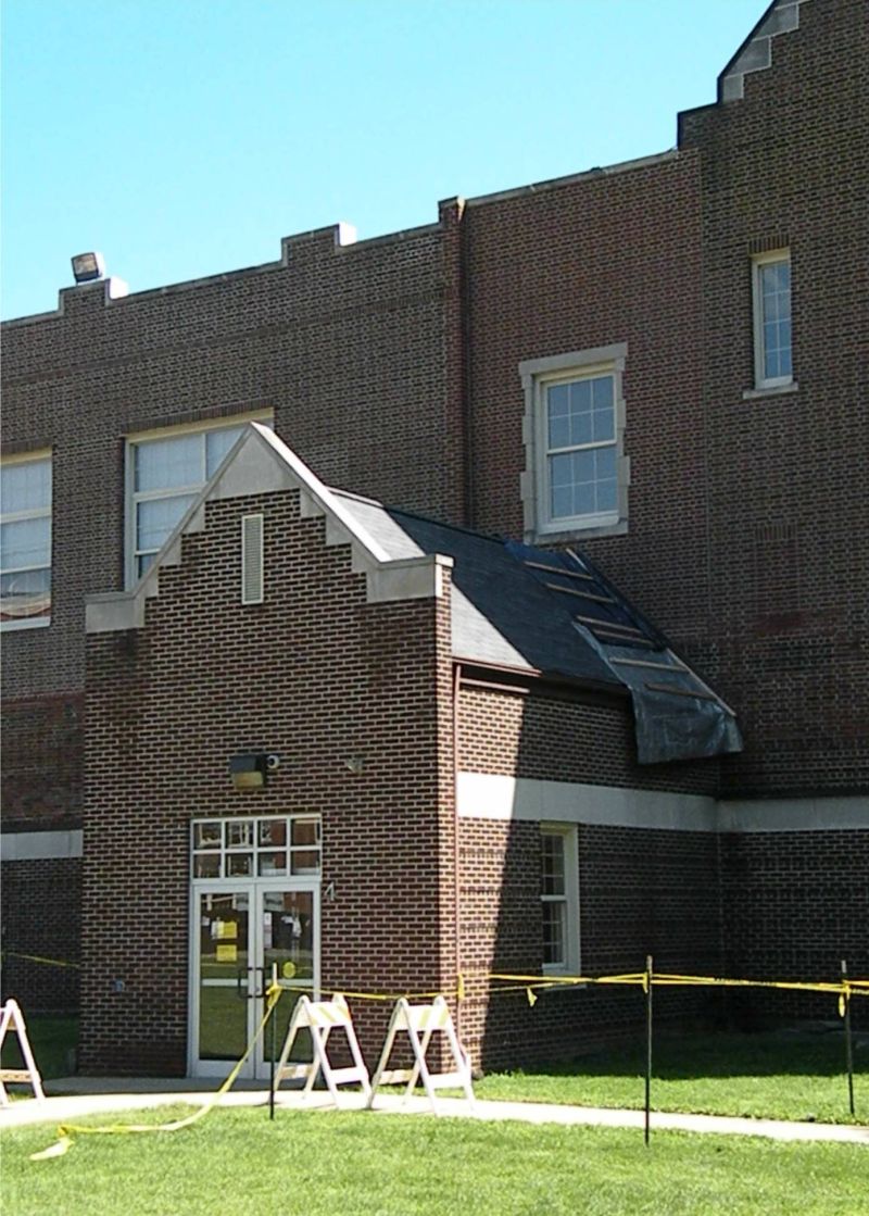 090511 (Update) Capstones topple from roof of Cornerstone Elementary School
