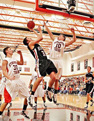 Balanced attack leads to Hawks' 72-44 win over Tigers