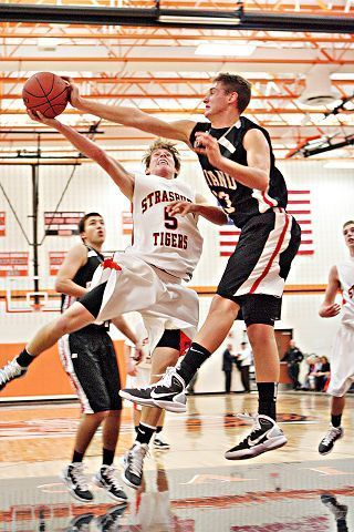 Balanced attack leads to Hawks' 72-44 win over Tigers