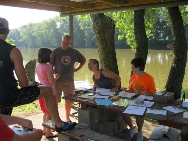 Canoe and kayak paddlers race to promote sport and river