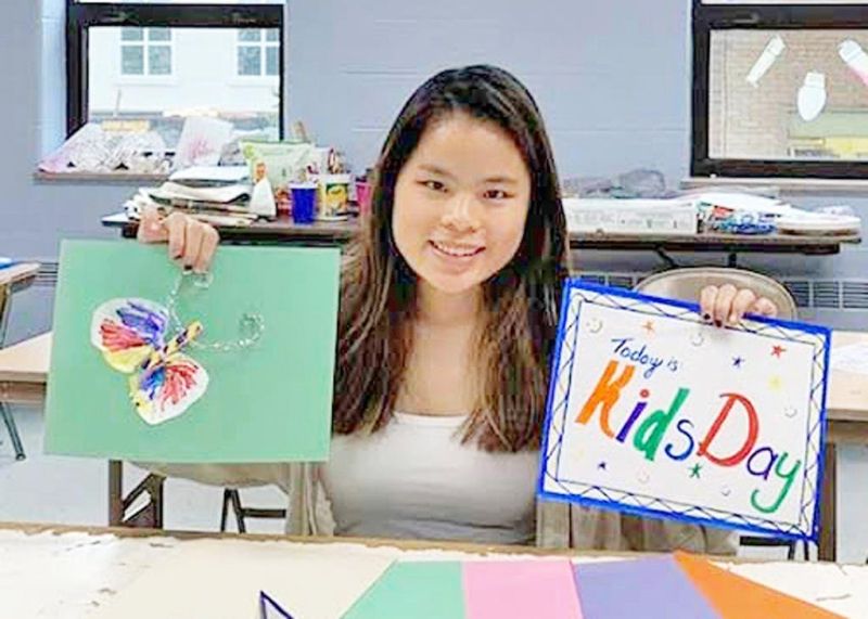 College of Wooster students learn,  also serve others
