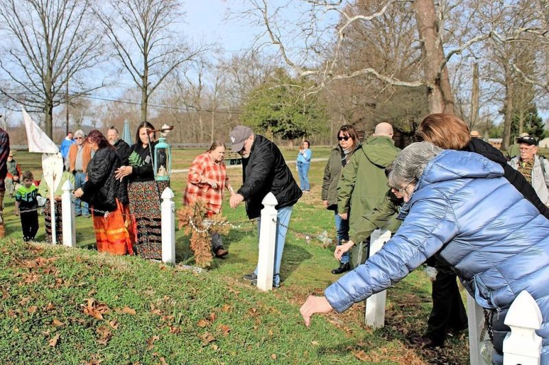 Community remembers massacre victims