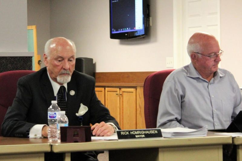 Council asks mayor to resign or retire