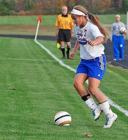 District title squared Lady Knights win on the pitch over Minerva as records fall
