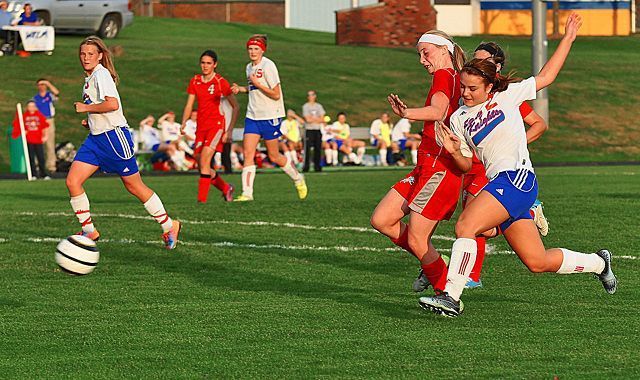 District title squared Lady Knights win on the pitch over Minerva as records fall