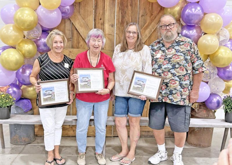 Fair honors volunteers with over a century of combined service