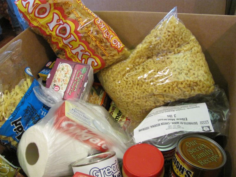 Gifts of food, toys, and clothing help to brighten Christmas for families