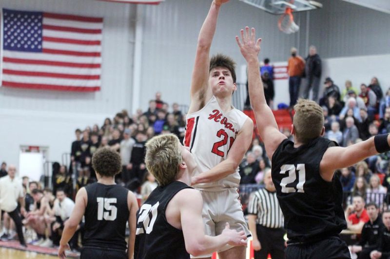 Hawks get thrilling 61-56 OT win for sectional title