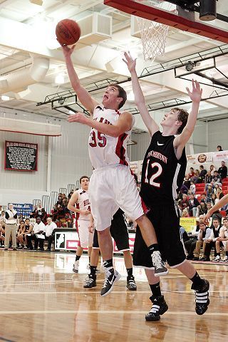 Hawks manhandle Titans in 72-36 victory