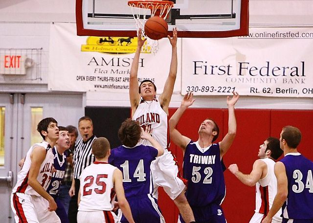 Hawks manhandle Titans in 72-36 victory