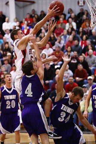 Hawks manhandle Titans in 72-36 victory
