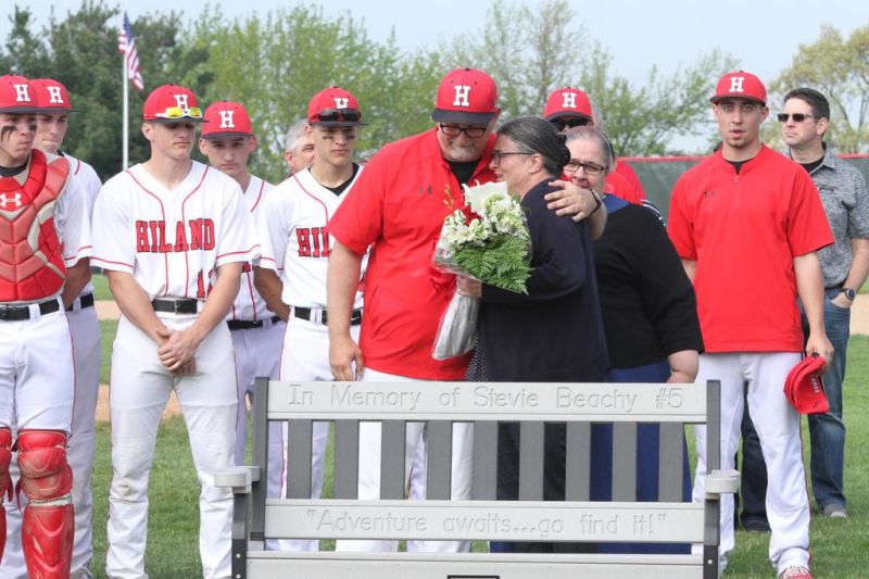Hiland baseball honors Dean and Stevie Beachy with bench dedication