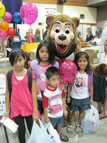 Kids received more than school supplies at church giveaway