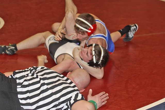 Knights split regular season mat finale and escape unharmed