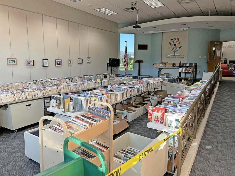 Library book sale to raise funds for a new sidewalk