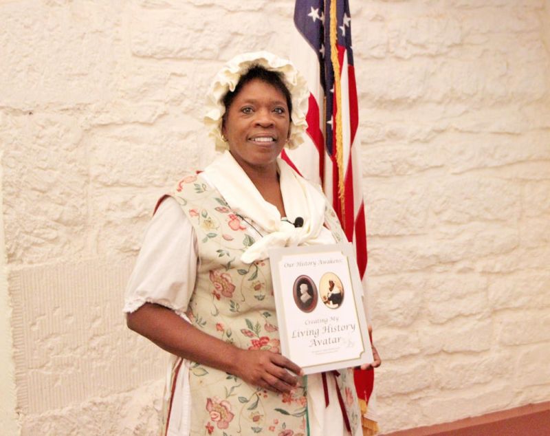 Living history interpreter to visit county library