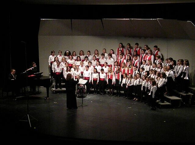 Members of the Childrens Chorus lift their voices in song