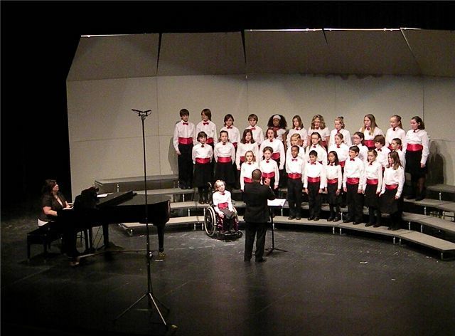 Members of the Childrens Chorus lift their voices in song