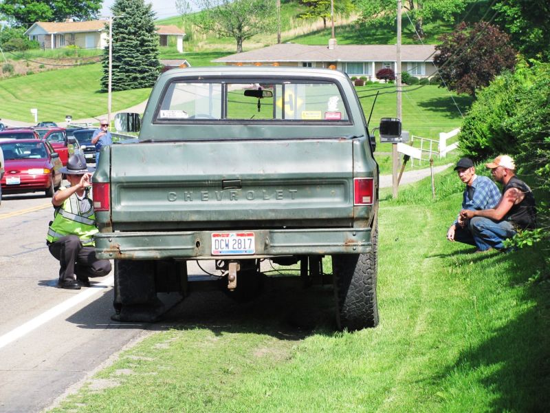 Motorcyclists collision with pickup truck results in fatality; numerous emergency personnel assist at the scene