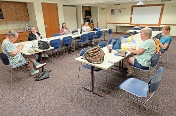 Orrville group knits friendship with yarn