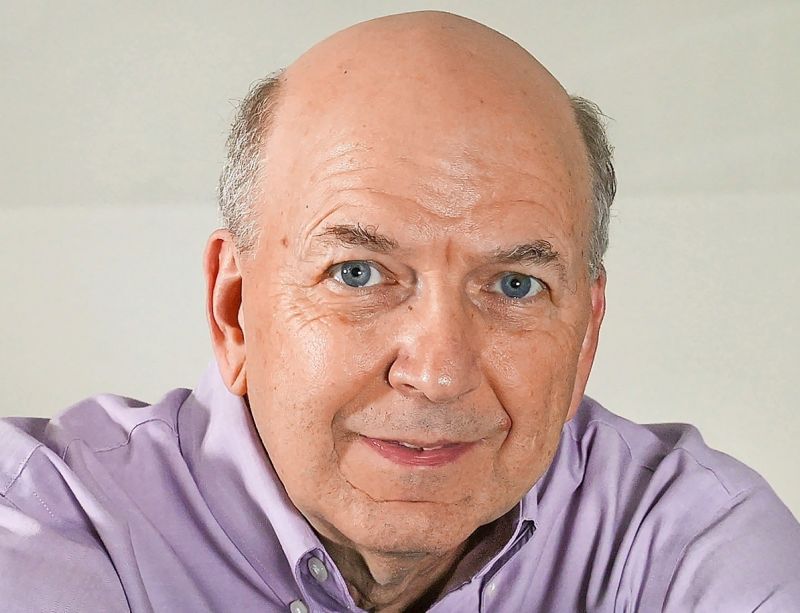 Pluto to talk sports at library