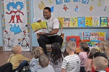 Reading program brings role models into classroom