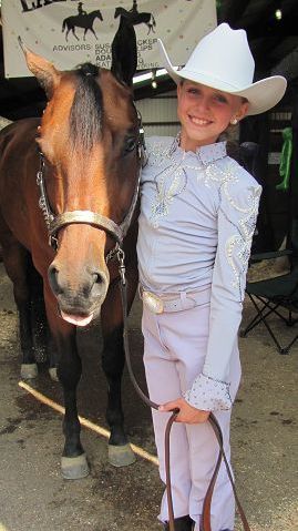 Ride em cowgirl – and cowboy: Western Horse Show produces sibling winners