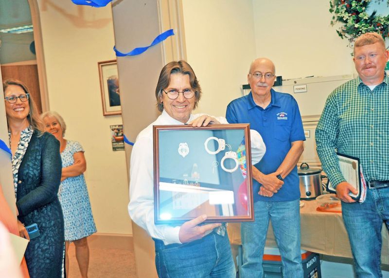 Russell retires after 32 years as juvenile probation officer