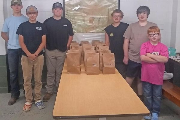 Shooting club packs goodies for veterans