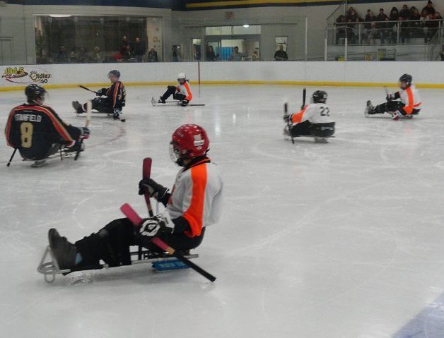 Sled hockey game entertains and inspires