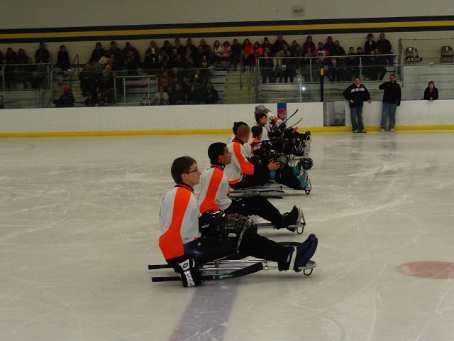 Sled hockey game entertains and inspires