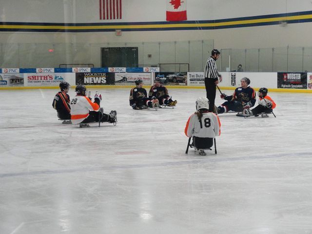 Sled hockey game entertains and inspires