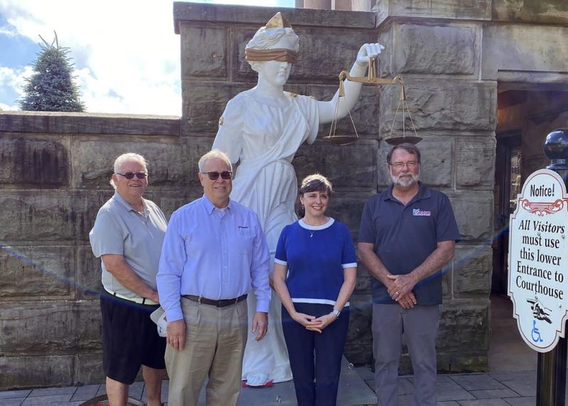 State officials attend Holmes courthouse clocktower placement day