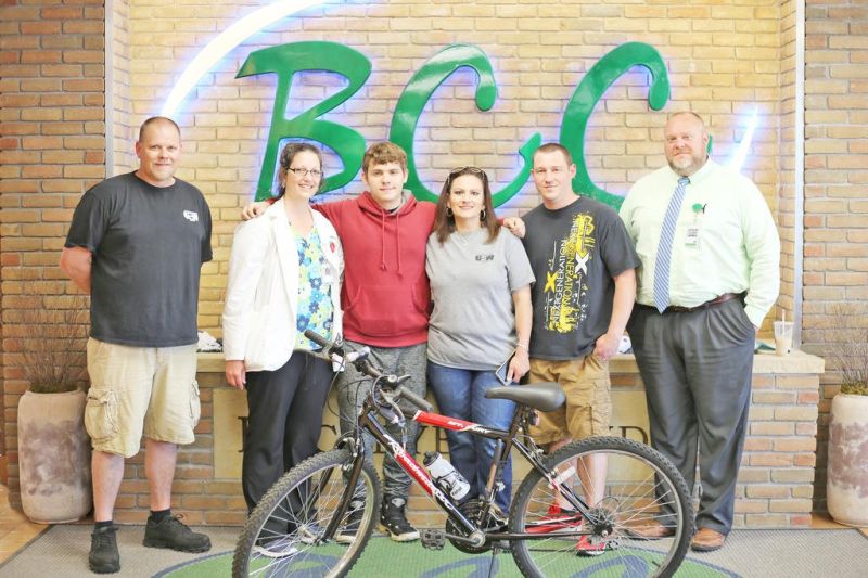 Steelworkers provide bike to student