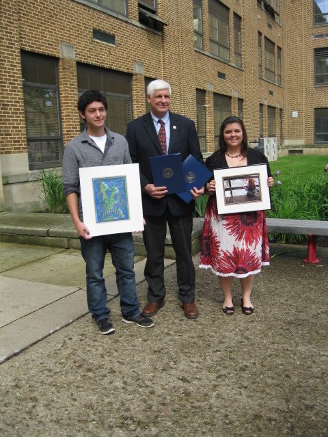 Two Dover High students honored by Congressman Gibbs at surprise ceremony