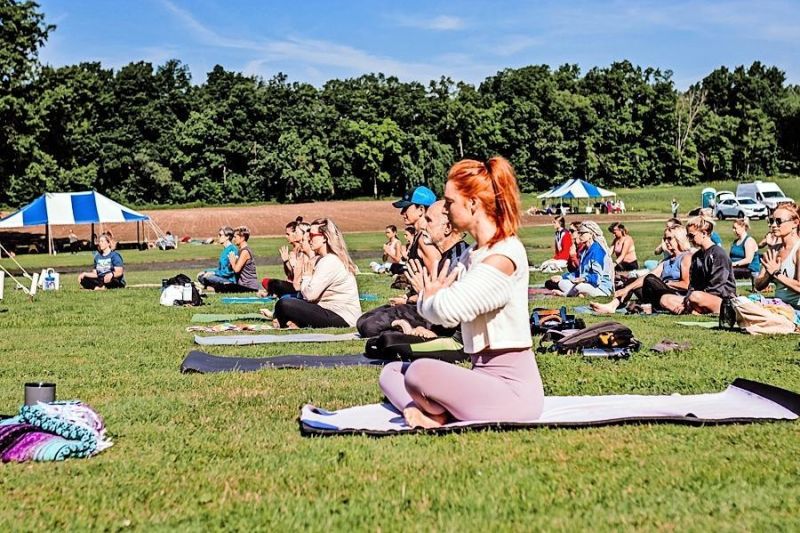 Upcoming event features yoga all day in a farm setting