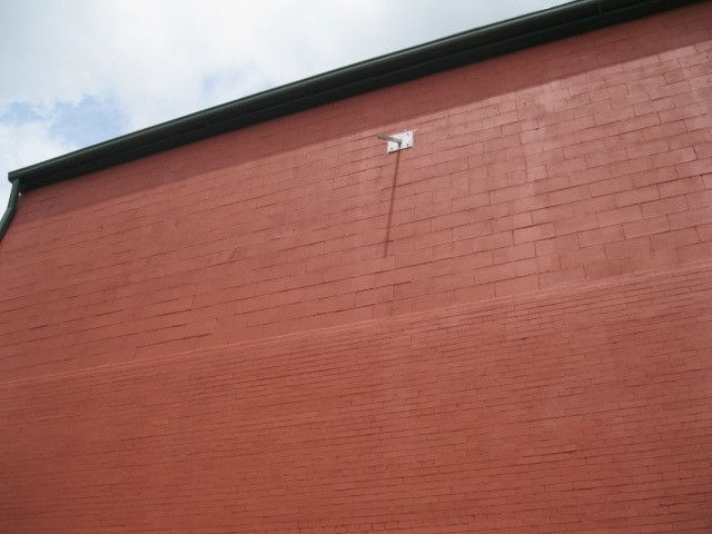 Vertical sundial being installed at downtown Wooster market