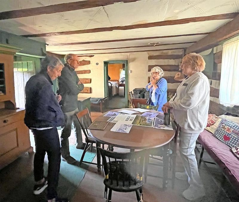 Visitors tour Bimeler Cabin in Zoar for the first time