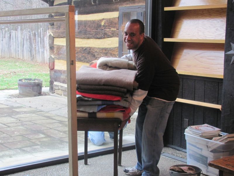 Volunteers give a Saturday morning to prep Schoenbrunn Village for 2011 season